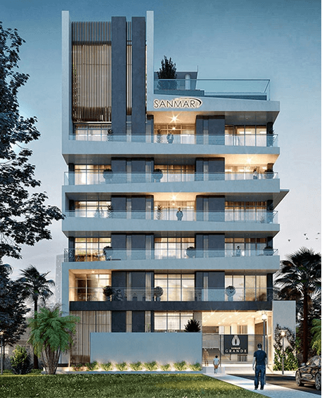 Modern residential building with balconies and greenery